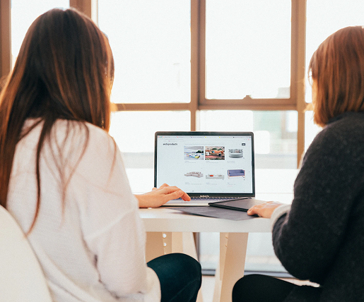 Two girls scrolling the page